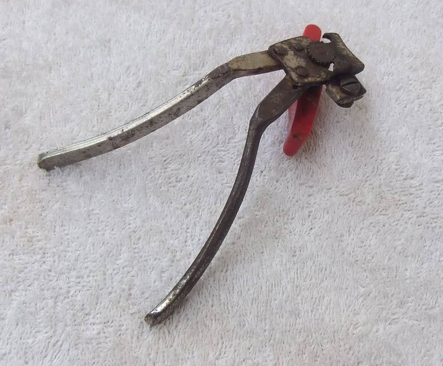 VINTAGE CAN AND BOTTLE OPENER