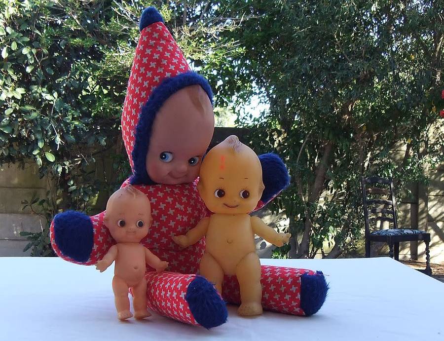 Three vintage Kewpie dolls for display