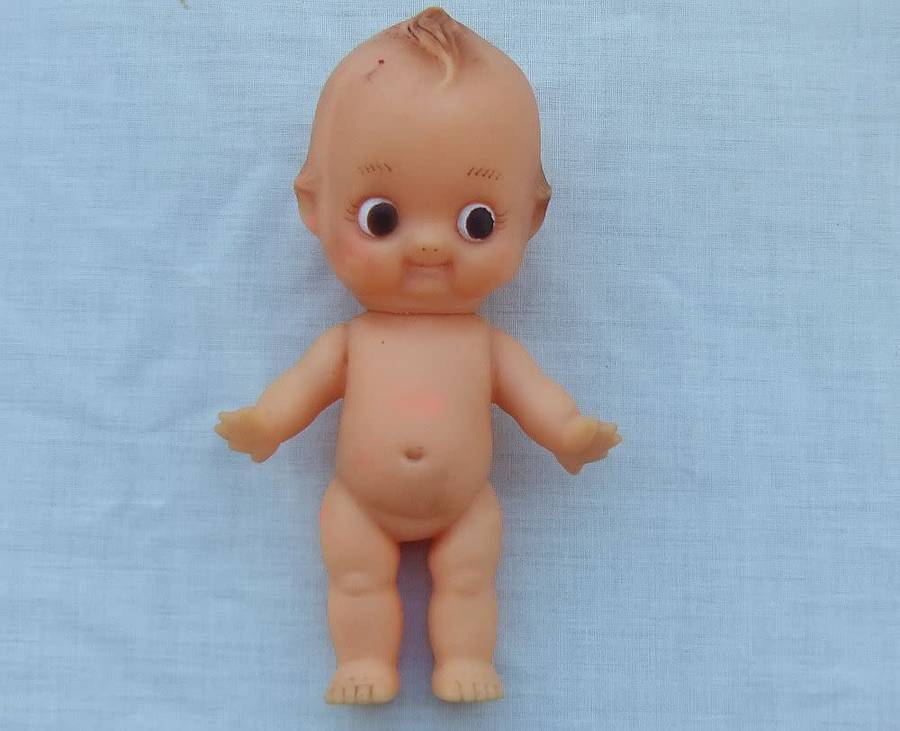 Three vintage Kewpie dolls for display