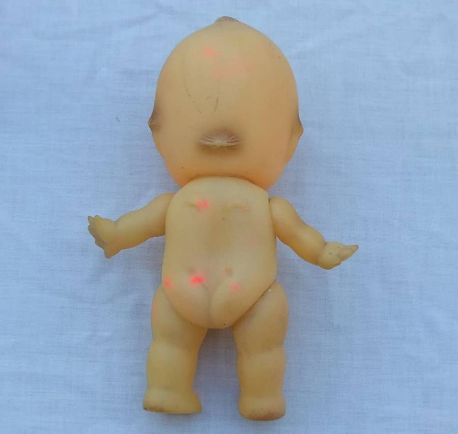 Three vintage Kewpie dolls for display