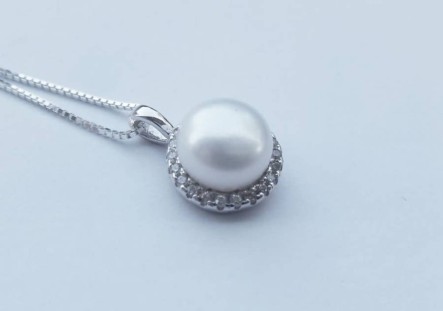 A genuine sterling silver necklace and genuine Mabe pearl pendant - Brand new - last one