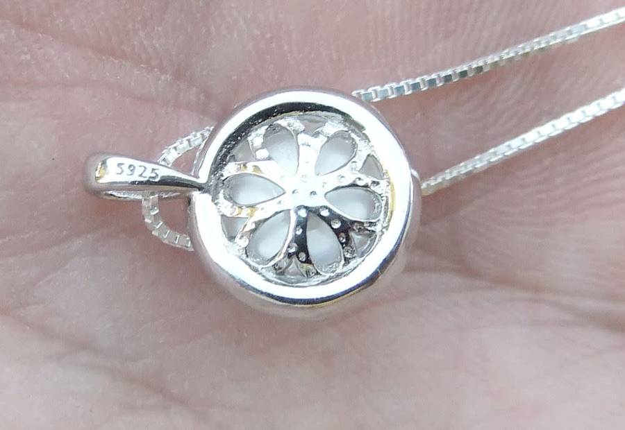 A genuine sterling silver necklace and genuine Mabe pearl pendant - Brand new - last one
