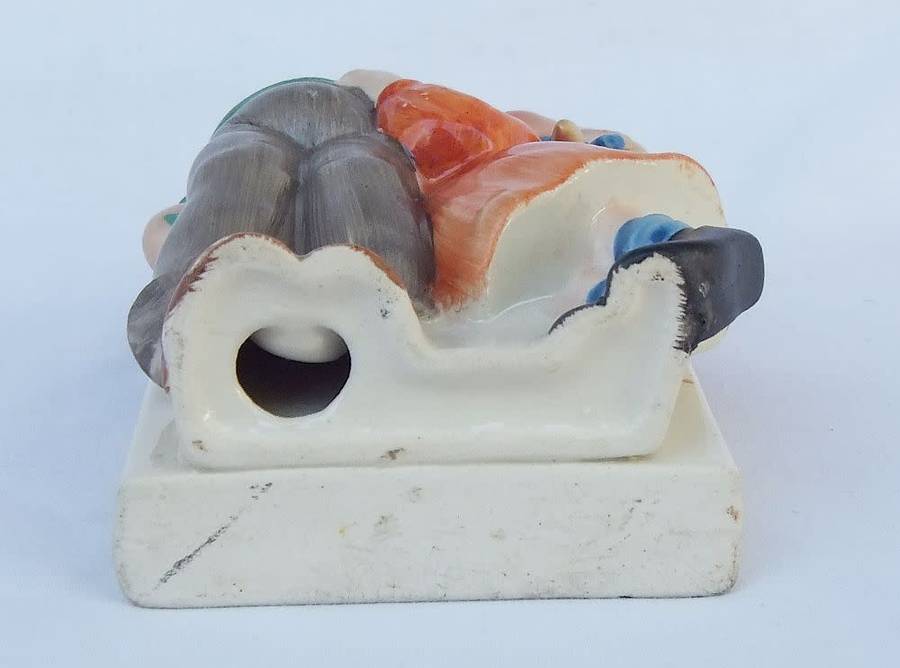 A very charming vintage Hummel look wall pocket or wall vase