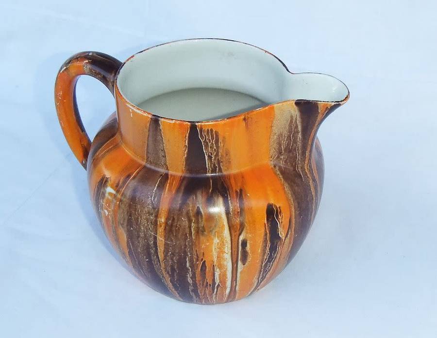 An eye catching Art Deco period hand painted porcelain jug by Myott , Son & Co