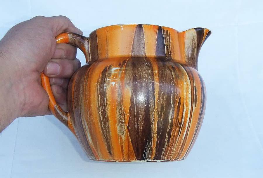 An eye catching Art Deco period hand painted porcelain jug by Myott , Son & Co