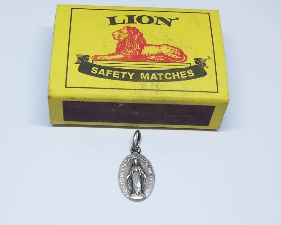 An insanely cute highly detailed vintage solid metal religious pendant / medallion made in France