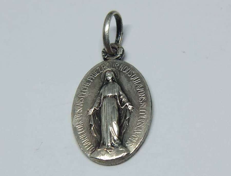 An insanely cute highly detailed vintage solid metal religious pendant / medallion made in France