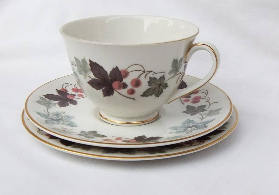 A charming vintage trio by Royal Doulton in the Camelot pattern