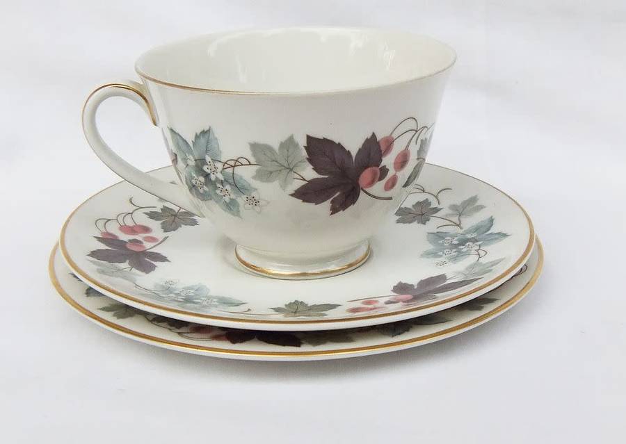 A charming vintage trio by Royal Doulton in the Camelot pattern