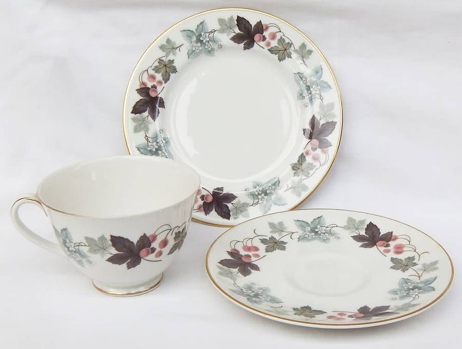 A charming vintage trio by Royal Doulton in the Camelot pattern