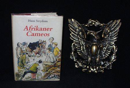 2 AFRICANA ITEMS - SIGNED FIRST EDITION AND BRANDWAG EAGLE