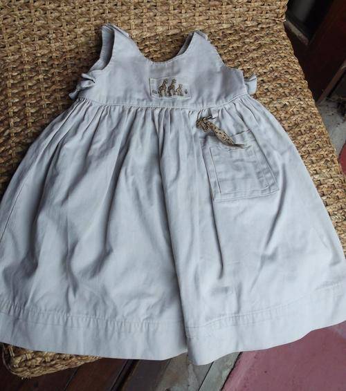 100% cotton safari style dress for little girl with giraffe and bow detail, size 3 years