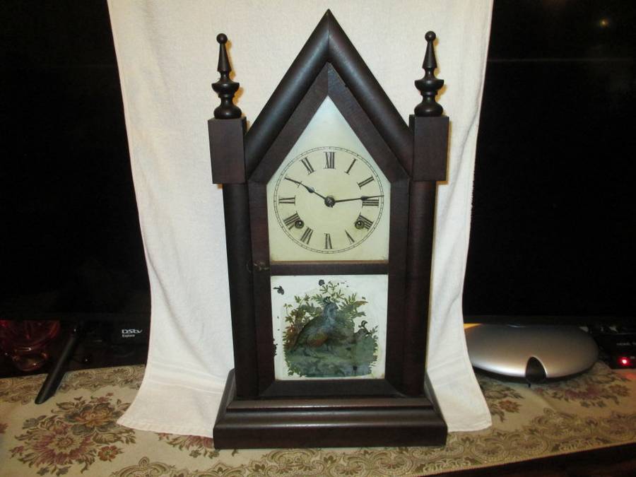 Antique Ansonia Steeple Clock in good and working Condtition with key. (Welcome to make an offer)