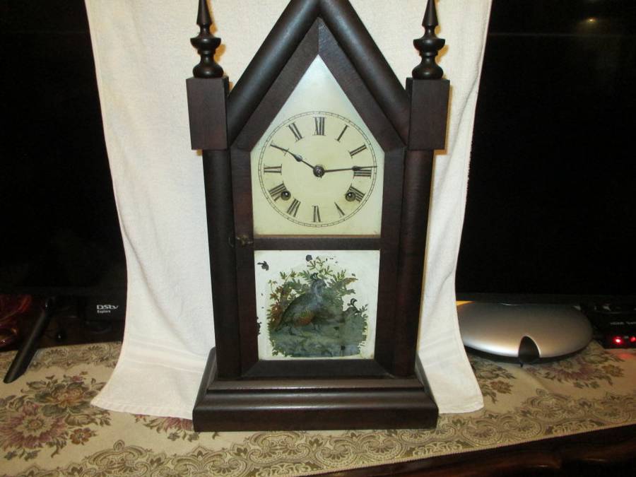 Antique Ansonia Steeple Clock in good and working Condtition with key. (Welcome to make an offer)