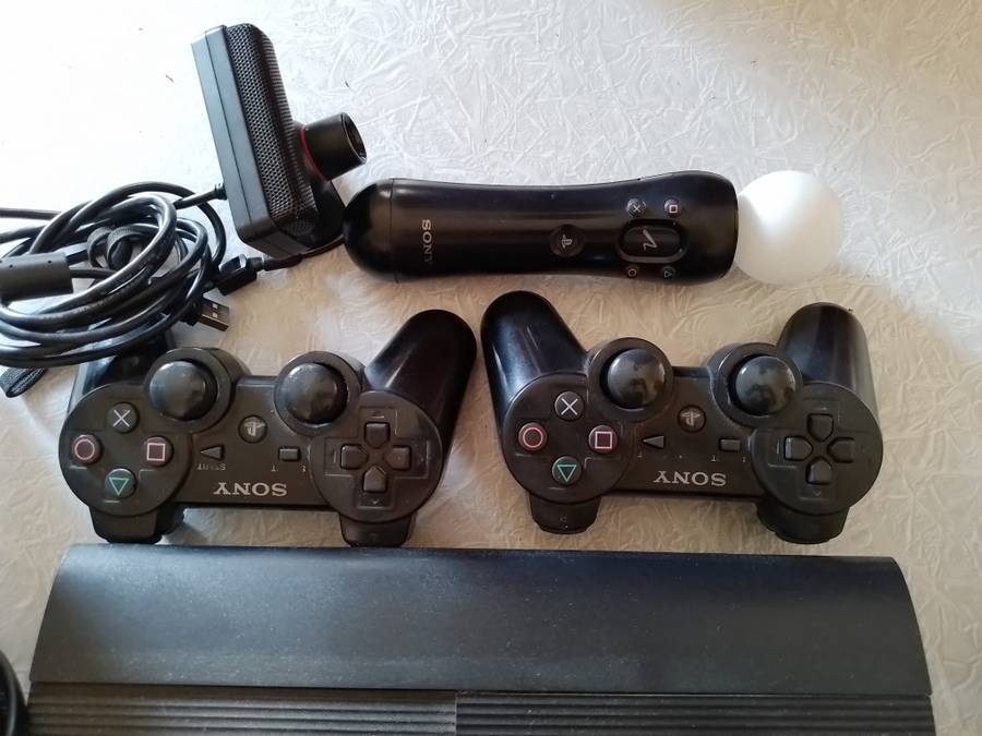 Ps3 Super Slim, remotes, games and Skylanders set