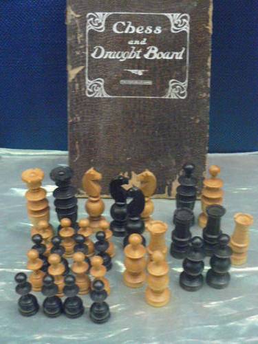 WOODEN CARVED CHESS PIECES COMPLETE WITH BOARD