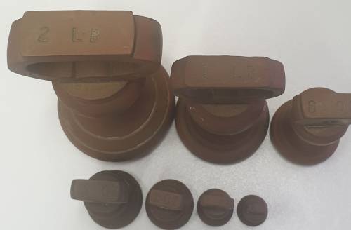 7 piece vintage brass bell weights
