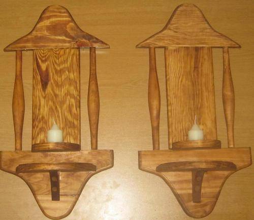 TWO SOLID WOOD WALL CANDLE HOLDERS