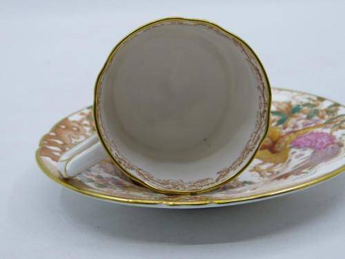 ROYAL CROWN DERBY DEMI TASSE AND SAUCER HAND PAINTED IN THE OLDE AVESBURY PATTERN A 73.