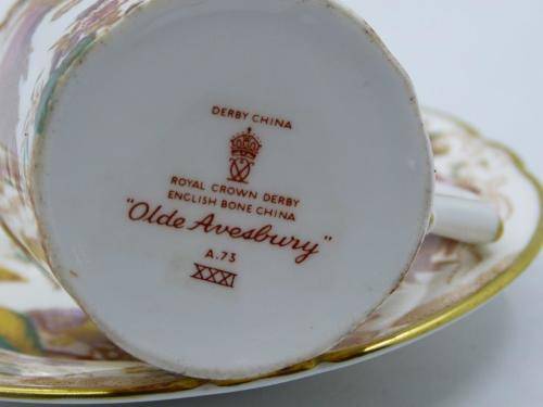 ROYAL CROWN DERBY DEMI TASSE AND SAUCER HAND PAINTED IN THE OLDE AVESBURY PATTERN A 73.