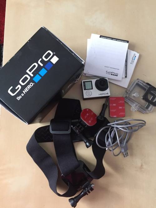 GOPRO HERO 4  INCLUDING WATHERPROOF HOUSING , BOX AND ACCESSORIES