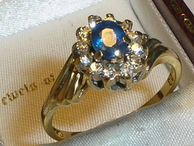 ***R22 000*** 9CT GOLD REAL SAPPHIRE & .25CT DIAMOND CLUSTER RING - O