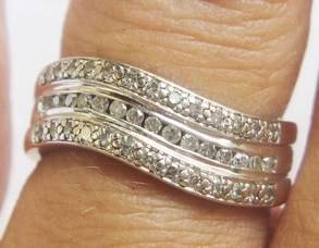 A FINE 9CT WHITE GOLD .50 CARAT DIAMOND ETERNITY RING SIZE M