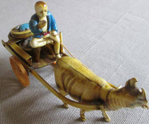 VINTAGE, CELLULOID, JAPANESE FISHERMAN, WITH HIS CATCH OF THE DAY, OX AND WAGON.