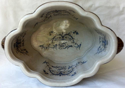 LARGE, HEAVY PORCELAIN, POT PLANT HOLDER WELL DECORATED WITH LEAVES, FLOWERS AND AN ANGEL OR TWO !!!