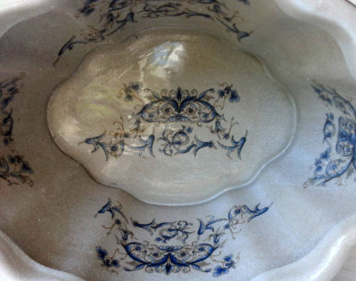 LARGE, HEAVY PORCELAIN, POT PLANT HOLDER WELL DECORATED WITH LEAVES, FLOWERS AND AN ANGEL OR TWO !!!