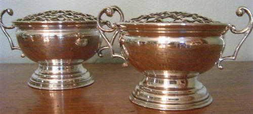 R1.00 PAIR OF SILVER PLATED ROSE BOWLS,WITH WIRE FLOWER HOLDERS, CONDITION GOOD