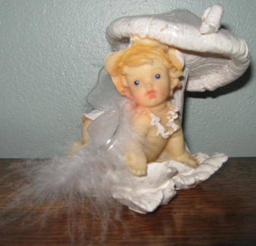 R1.00 ARE YOU LOOKING FOR A CUTE FAIRY, THIS ONE HIDING UNDER A TOAD STOOL !!!