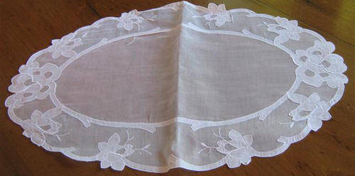 VINTAGE, OVAL SHAPED TRAY CLOTH MADE FROM VOILE, THE DESIGN IS APPLIQUED IN DOUBLE VOILE.