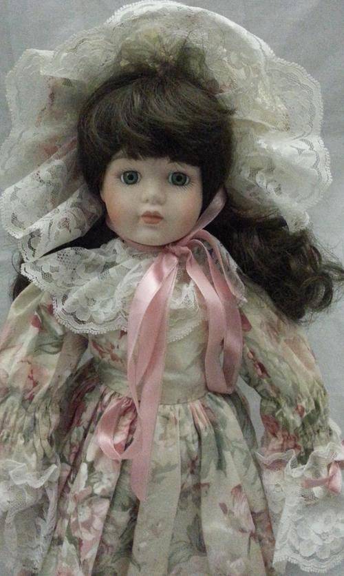 REALLY A STUNNING VINTAGE PORCELAIN DOLL TO ADD TO YOUR COLLECTION