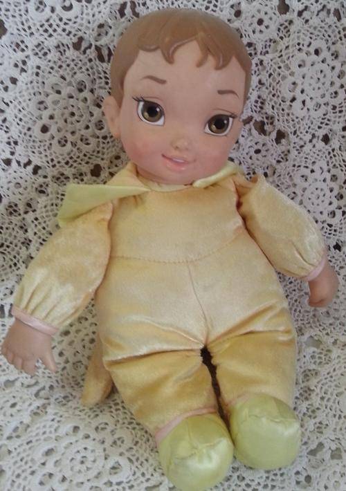 DISNEY BABY DOLL..PRESS HER TUMMY AND SHE GIGGLES JUST SOOOO SWEET