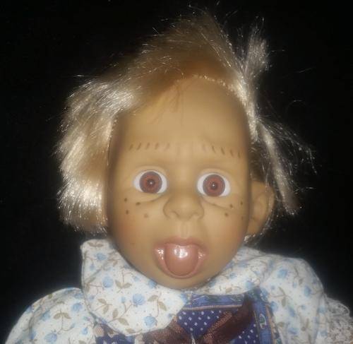 NOW ONLY A MOTHER CAN LOVE THIS FACE OF THIS DOLL