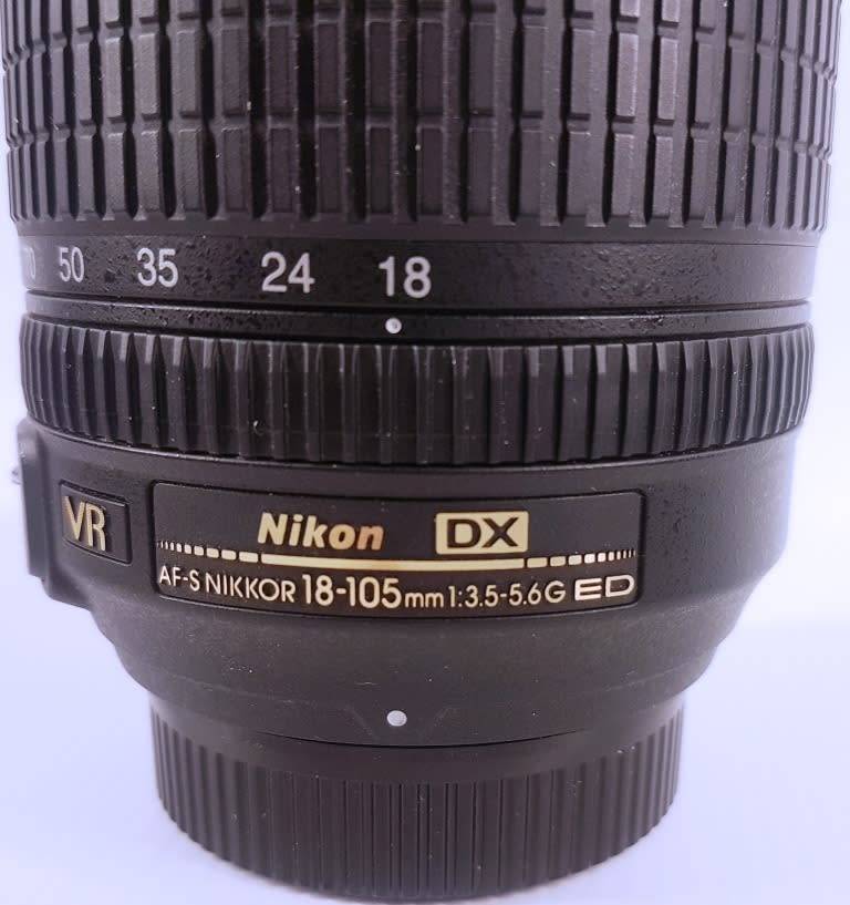 Nikon D7000 Camera Body with AF-S Nikkor 18-105mm 1:3.5-5.6G ED Lens Charger Battery Backpack