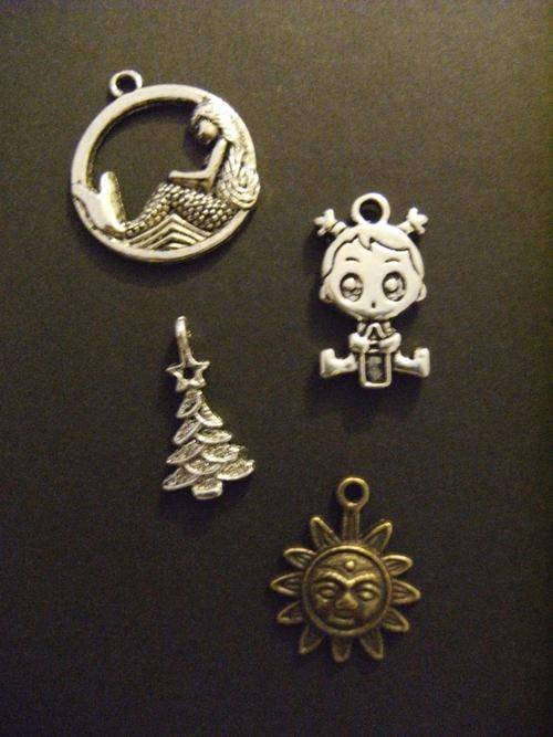Four different charms metal