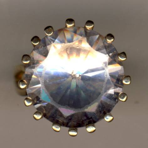 8 gram gold ring with large white sapphire -