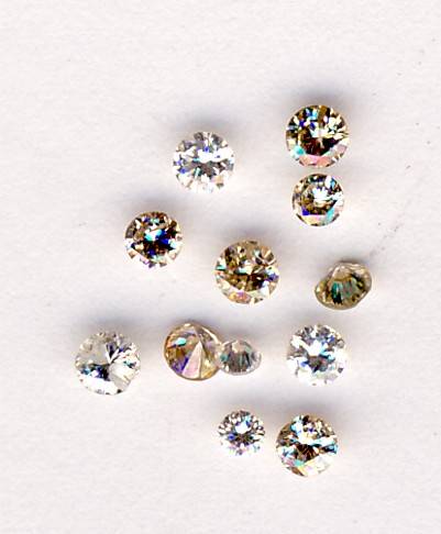 Lot of 12 roughly same size Diamonds with total weight of 0.60 Ct
