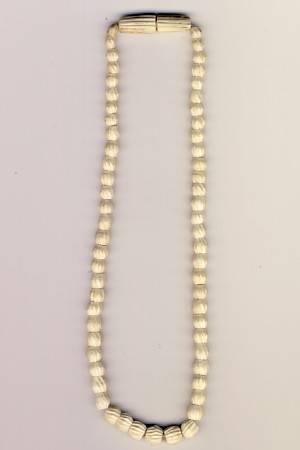 Faux ivory necklace as per scan