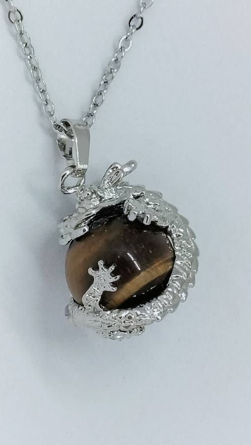 Stunning Tiger`s Eye Stone Pendant With Stainless Steel Casing Of A Dragon