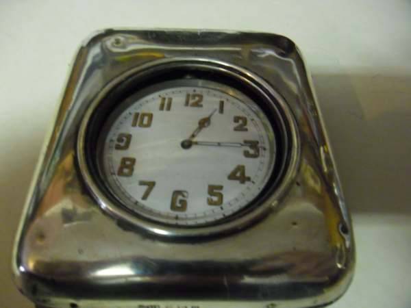 POCKET TRAVEL CLOCK IN HALLMARKED SILVER CASE