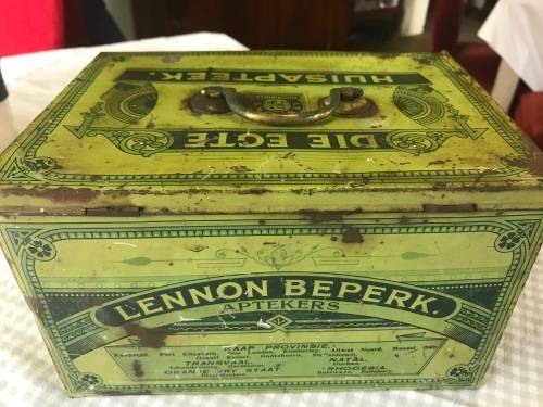 Lennon se Egte Huis Apteek with some medicine in the original packing