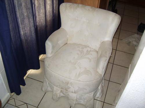 Uphostered wingback chair.