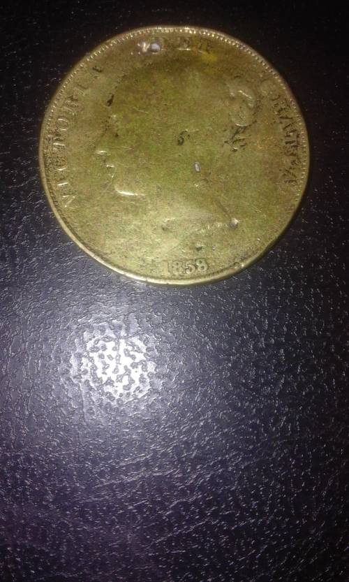 1858 1 or 1/2 penny from Brittan(NB its got a hole in it)