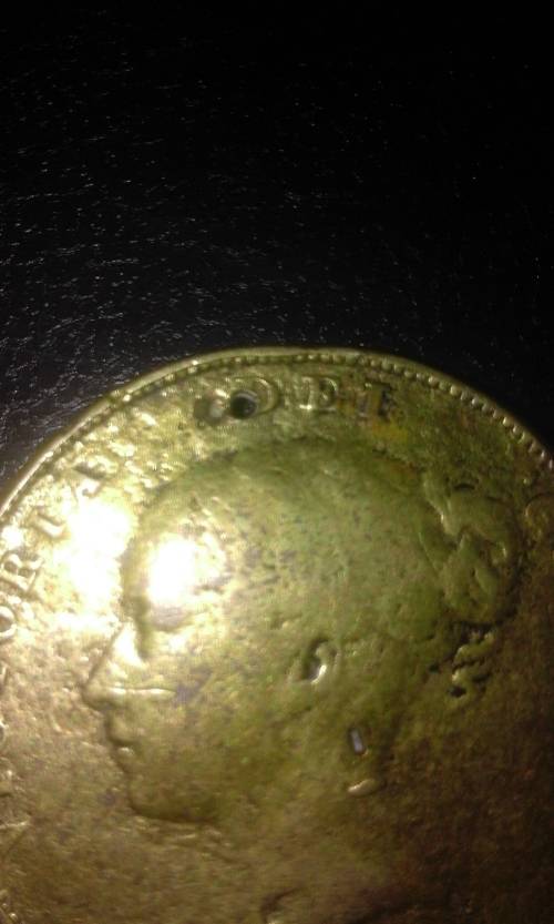 1858 1 or 1/2 penny from Brittan(NB its got a hole in it)