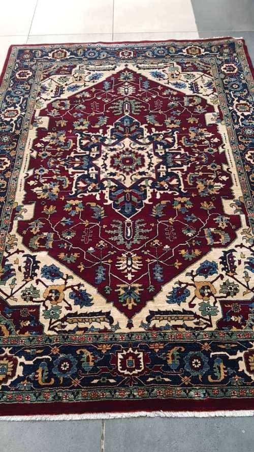 Heris Design Persian carpet