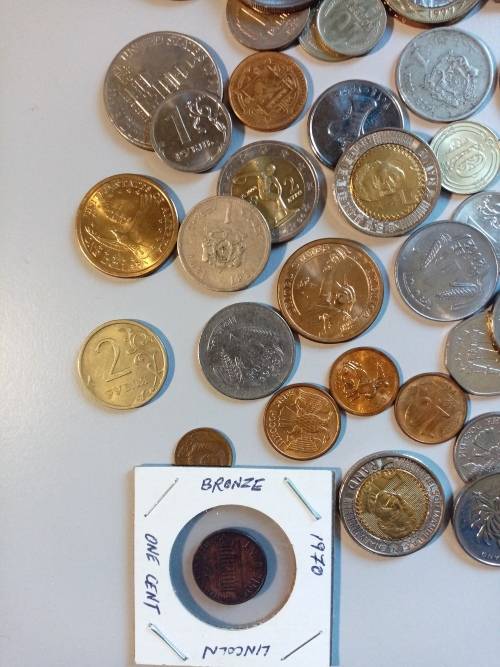 **LOT OF WORLDWIDE WEST TO EAST SILVER AND OTHER COINS**
