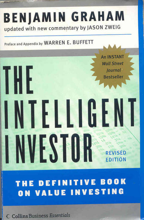 The Intelligent Investor by Benjamin Graham ( Revised Edition )